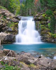 Fototapeta na wymiar Las Gradas de Soaso waterfall in the Ordesa y Monte Perdido national park, in the Aragonese Pyrenees, located in Huesca, Spain