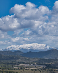 view of a mountain with the snowy summit, in Alicante, in the Valencian Community, Spain