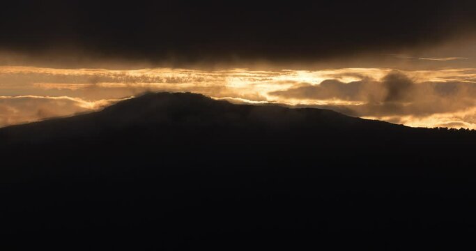 Timelapse video of breathtaking summer sunset landscapes, mountainous, misty and full of clouds, on the Galician coast, Ortigueira, near Cape Ortegal, La Coru&ntilde;a province, Spain.
