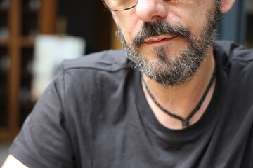 Close up portrait of matured bearded man; focus on beard.