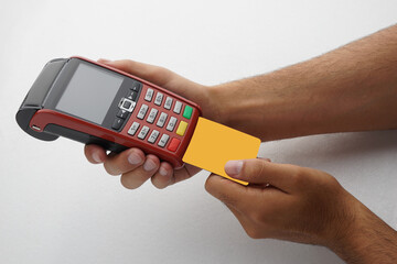 Hand using credit card payment machine. card machine terminal payment credit reader pay bank concept