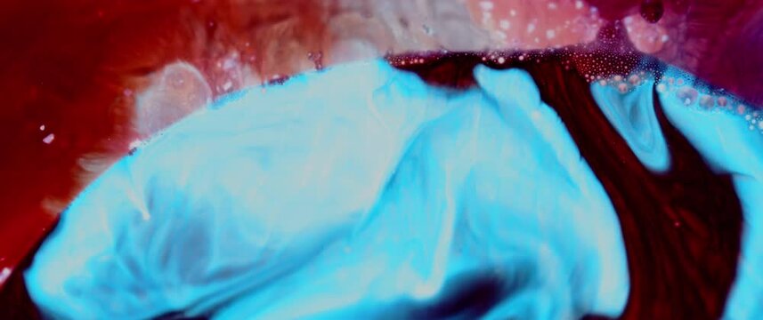 Macro Textures with Vibrant Neon Color Palette. Abstract Background Made with Oil Mixed with Blue and Red Dye, Ink, and Paint.