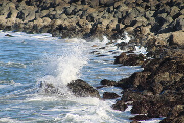 Waves crashing against rocks