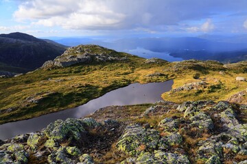 Stord island landscape in Norway. Mountain view of Kattnakken. Tysnesoy island in background.