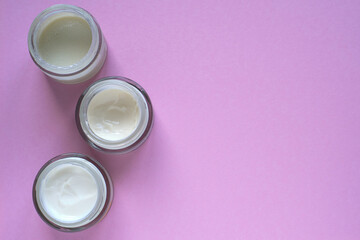 Obraz na płótnie Canvas Bottles of face care cream