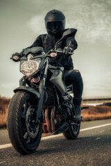biker on the motorcycle - obrazy, fototapety, plakaty