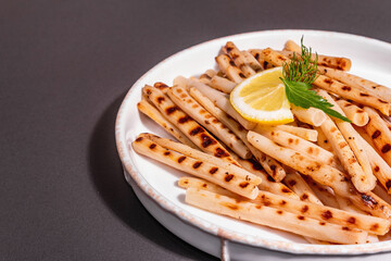 Grilled scorzonera with modern hard light, dark shadow