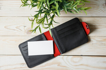 Business cards blank or bank card in a leather wallet.
