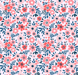 Floral pattern. Pretty flowers on light pink background. Printing with small red and pink flowers. Ditsy print. Seamless vector texture. Spring bouquet. Stock vector.