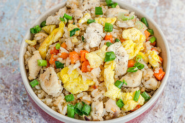 Asian Chicken and Egg Fried Rice Directly Above Close-Up Photo
