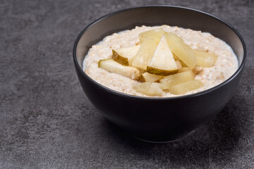 Oat in the black bowl