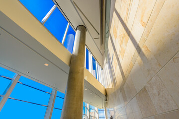 Obraz premium Abstract fragment of the architecture of modern lobby, hallway of the luxury hotel, shopping mall, business center in Vancouver, Canada. Interior design.
