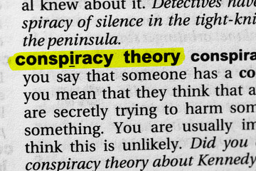 Highlighted word conspiracy theory concept and meaning.
