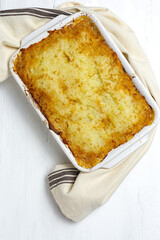 Traditional homemade shepherd pie on white background. Cottage foot