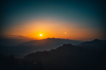 Sunset above valley Buddhist monastery Nepal in the Himalaya mountains
