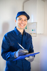 Technician servicing an hot-water heater