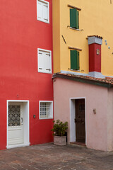 Fototapeta na wymiar Colorful Venetian houses of Caorle city