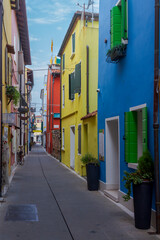 Fototapeta na wymiar Among the colorful alleys of Caorle city
