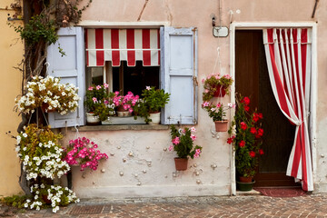 Among the flowery houses of Caorle's city