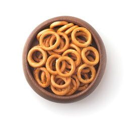 Wooden bowl of salty crispbread wheat mini rings