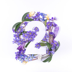 Layout with spring flowers and number two. Anniversary concept.