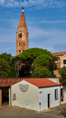 Fototapeta na wymiar The bell tower of the Caorle's city in the province of Venice