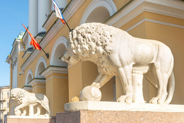 Lion sculpture at the entrance to the historic building  in the central historical part of St....