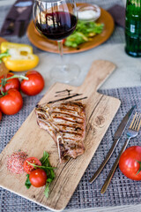 Lunch. Salad and meat. Wine