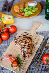 Lunch. Salad and meat. Wine
