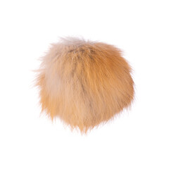 Close up of brown fox fur pompom isolated on white background. Fox fur