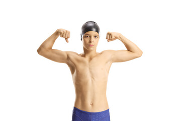 Fototapeta premium Teenage boy swimmer flexing muscules and looking at camera