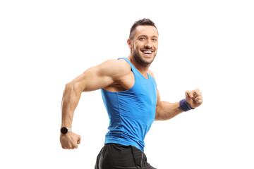 Fit man in sportswear running and looking at camera