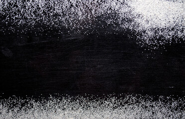 White sand on a black background, texture