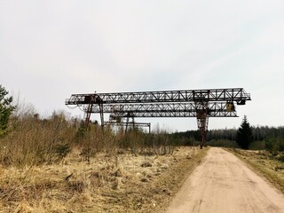 Fototapeta na wymiar very old cranes in an abandoned factory