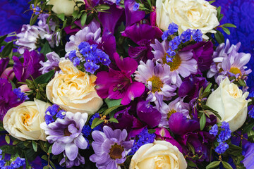 Beautiful flowers in a bouquet. Blue, white, and purple flowers. Background flower image.