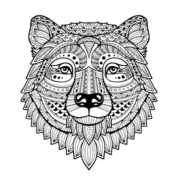 Bear head in style zentangle. Patterned bear's head on the grunge background. African, indian design. It may be used for design of a t-shirt, bag, postcard, a poster and so on. Logo. Icon. Vector.
