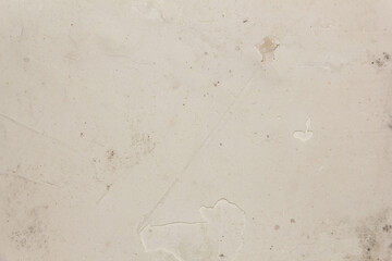 Shabby putty background. Vintage ancient background. Light shade textured old wall