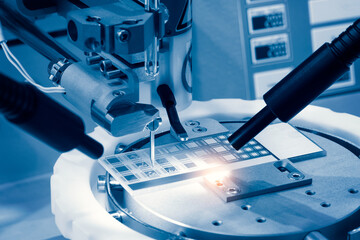 automatic machinery for soldering electronic components. soldering iron tips of robotic system for...