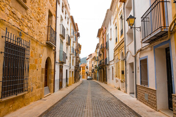 Atzeneta del Maestrat, Castellon province, Valencian Community, Spain. Beautiful historic street. Traditional and typical spanish village.
