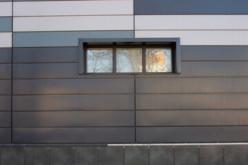 modern coating of buildings with multi-colored metal plates