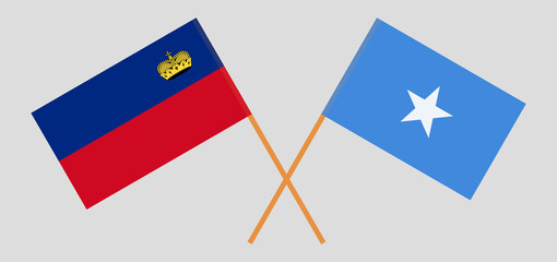 Crossed flags of Liechtenstein and Somalia. Official colors. Correct proportion