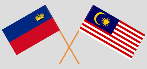 Crossed flags of Liechtenstein and Malaysia. Official colors. Correct proportion