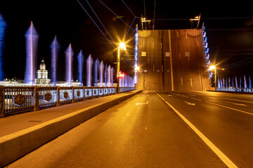 Naklejka na ściany i meble Laying bridges in St. Petersburg. Night city of Russia. Neva River.