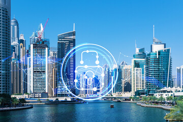 Skyscrapers of Dubai business downtown. International hub of trading and financial services. Lock...