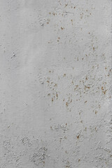 Shabby old paint background. Vintage ancient background. Gray tint of textured old wall. Cracked paint