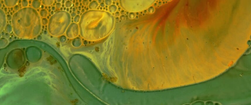 Macro Textures with Vibrant Neon Color Palette. Abstract Background Made with Oil Mixed with Green and Yellow Dye, Ink, and Paint.