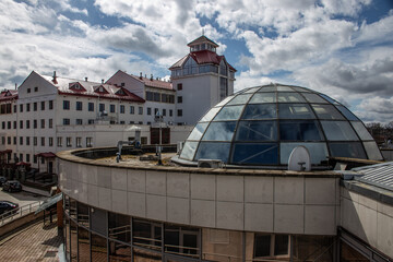 glass dome against the backdrop of the cityscape and sky