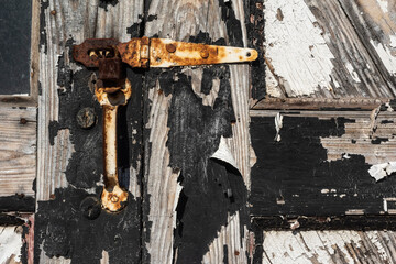 Rusty Lock on Distressed Door