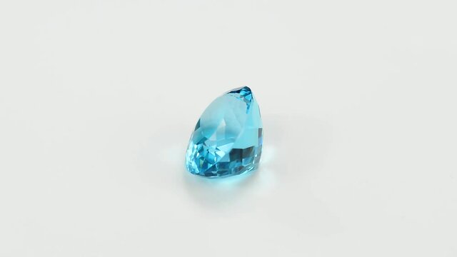 Natural sky blue topaz. Oval cut, checkers faceted, loupe clean - VVS,IF,FL. Heated, treated, irradiated, color enhanced. Full of sparkle semiprecious gemstone in satin polished Aluminum background