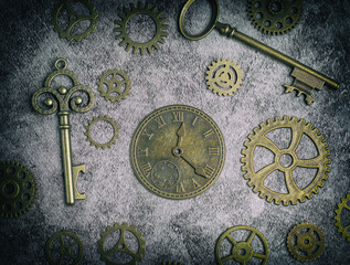 Fototapeta na wymiar Steampunk style image with a clock, keys, cogs and gears.